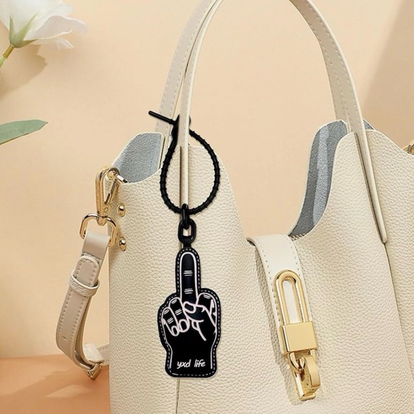 The Unbranded Brand Accessories - Cool Expression Middle Finger Black BAG CHARM